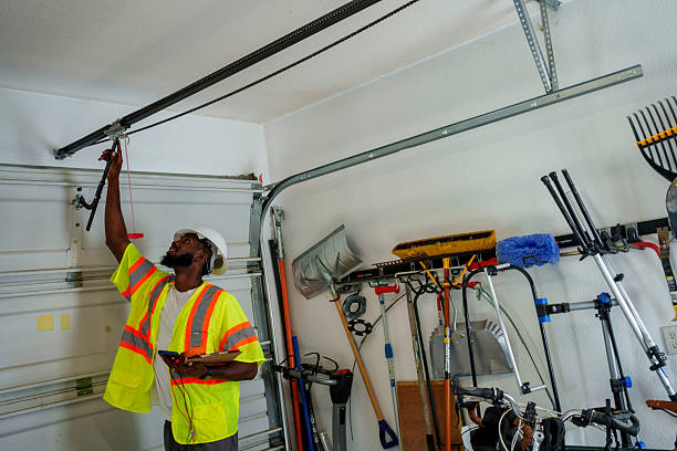 Professional Garage Door Panel Replacement technician working in Montezuma, IA